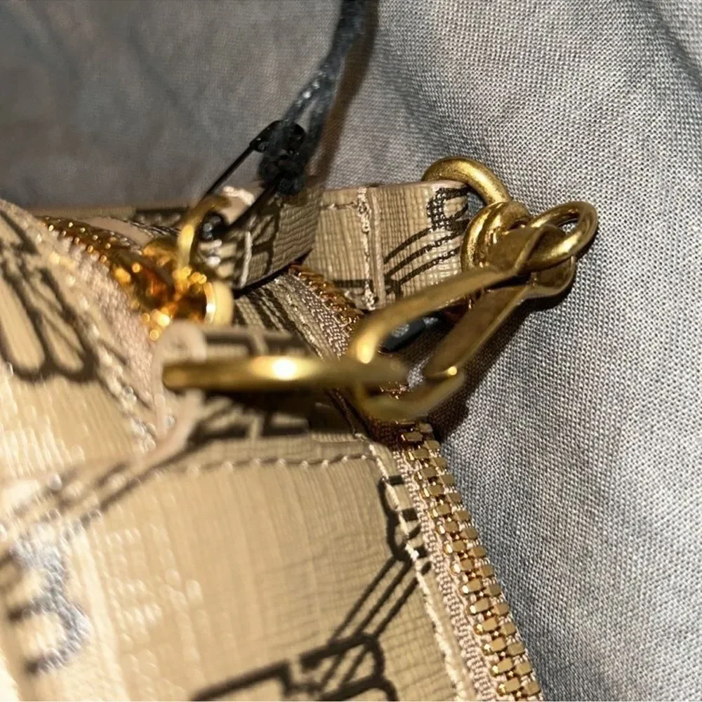 Authentic Balenciaga Signature BB Leather Pouch.